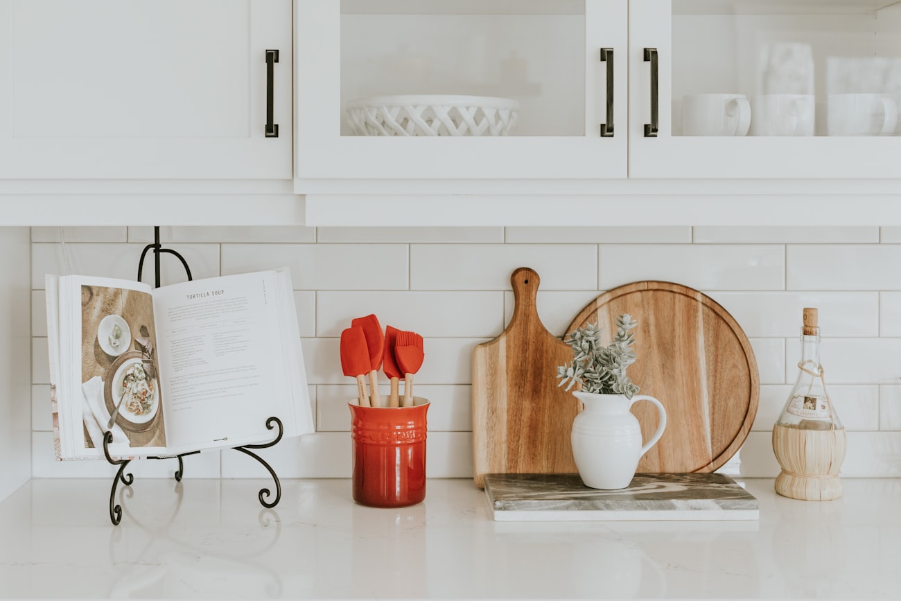 A first-time buyer holding the keys to their new home